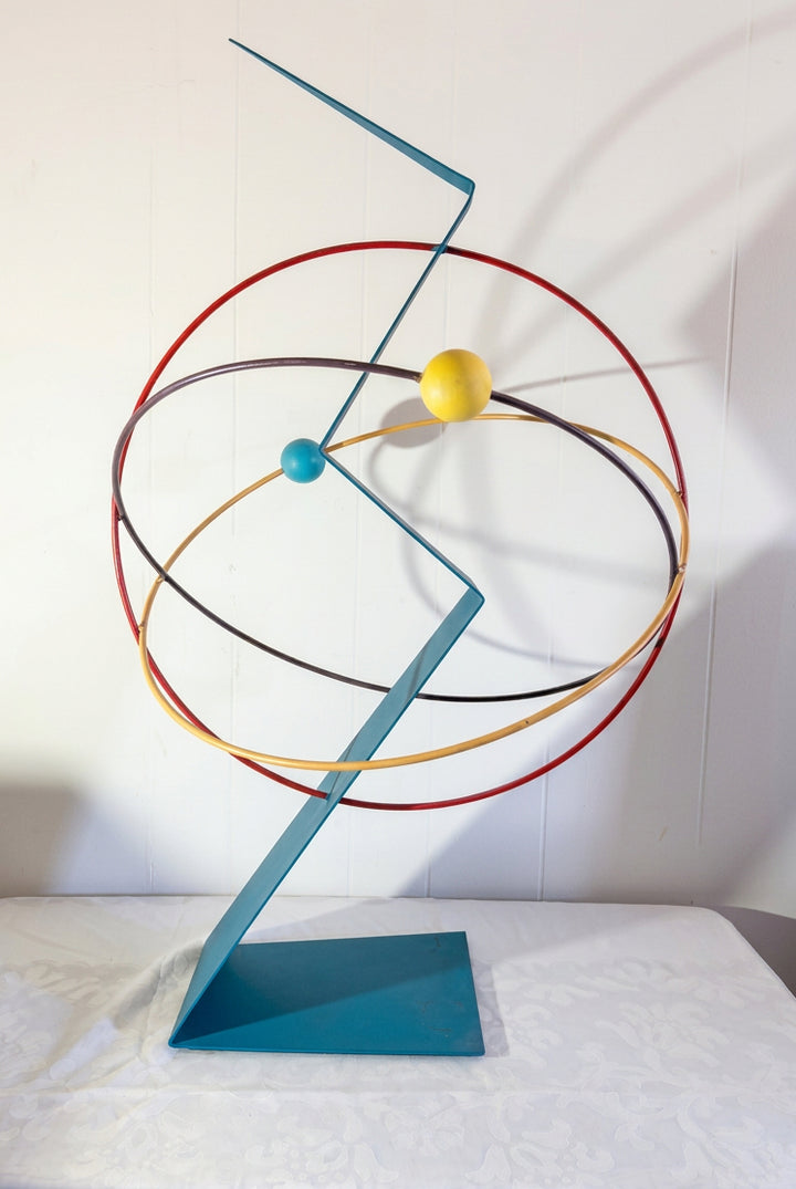 geometiric sculpture in primary colors , blue , red and yellow