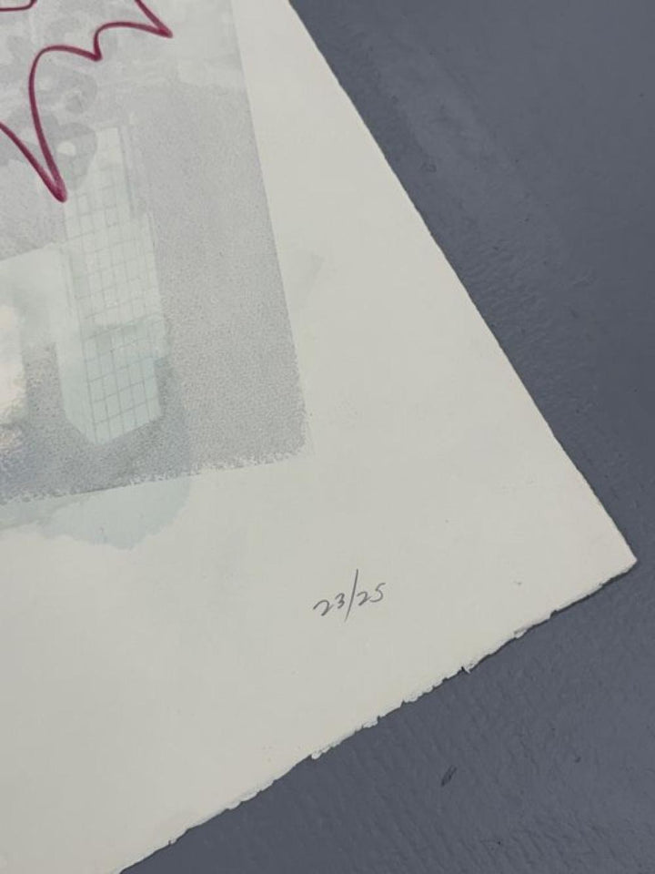 Artistic print with a signature on a textured surface